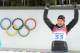SOCHI, RUSSIA - FEBRUARY 09: Gold medalist Anastasiya Kuzmina of Slovakia celebrates during the flower ceremony after the Women's 7.5 km Sprint during day two of the Sochi 2014 Winter Olympics at Laura Cross-country Ski & Biathlon Center on February 9, 2