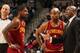 CHARLOTTE, NC - NOVEMBER 1: Kyrie Irving #2 and Jarrett Jack #1 of the Cleveland Cavaliers confer with Coach Mike Brown during the game against the Charlotte Bobcats at the Time Warner Cable Arena on November 1, 2013 in Charlotte, North Carolina. NOTE T