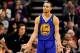Feb 8, 2014; Phoenix, AZ, USA; Golden State Warriors guard Stephen Curry (30) reacts to a call during the second quarter against the Phoenix Suns at US Airways Center. The Suns won 122-109. Mandatory Credit: Casey Sapio-USA TODAY Sports