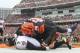 CINCINNATI, OH - DECEMBER 29: Carlos Dunlap #96 of the Cincinnati Bengals slams Joe Flacco #5 of the Baltimore Ravens to the turf during their game at Paul Brown Stadium on December 29, 2013 in Cincinnati, Ohio. The Bengals defeated the Ravens 34-17. (