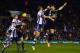 WEST BROMWICH, ENGLAND - FEBRUARY 11: Gareth McAuley of West Brom and Branislav Ivanovic of Chelsea compete for the ball during the Barclays Premier League match between West Bromwich Albion and Chelsea at The Hawthorns on February 11, 2014 in West Bromw