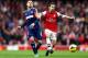 LONDON, ENGLAND - JANUARY 18: Mathieu Flamini of Arsenal holds off Clint Dempsey of Fulham during the Barclays Premier League match between Arsenal and Fulham at Emirates Stadium on January 18, 2014 in London, England. (Photo by Clive Mason/Getty Images