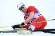 SOCHI, RUSSIA - FEBRUARY 14: Dario Cologna of Switzerland collapses in the snow after competing in the Men's 15 km Classic during day seven of the Sochi 2014 Winter Olympics at Laura Cross-country Ski & Biathlon Center on February 14, 2014 in Sochi, Russ