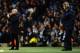 MANCHESTER, ENGLAND - FEBRUARY 03: Manuel Pellegrini manager of Manchester City looks on as Jose Mourinho manager of Chelsea give instructions during the Barclays Premier League match between Manchester City and Chelsea at Etihad Stadium on February 3,