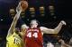 Feb 16, 2014; Ann Arbor, MI, USA; Michigan Wolverines forward Jon Horford (15) and Wisconsin Badgers forward Frank Kaminsky (44) goes for the rebound in the second half at Crisler Arena. Wisconsin won 75-62. Mandatory Credit: Rick Osentoski-USA TODAY Spor