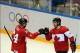 Feb 13, 2014; Sochi, RUSSIA; Canada defenseman Drew Doughty (8) celebrates with forward Corey Perry (24) after scoring a goal against Norway in a men's ice hockey preliminary round game during the Sochi 2014 Olympic Winter Games at Bolshoy Ice Dome. Manda
