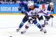 SOCHI, RUSSIA - FEBRUARY 16: Joe Pavelski #8 of the United States handles the puck against Robet Sabolic #55 of Slovenia in the third period during the Men's Ice Hockey Preliminary Round Group A game on day nine of the Sochi 2014 Winter Olympics at Shayba
