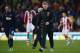 STOKE ON TRENT, ENGLAND - FEBRUARY 01: David Moyes, manager of Manchester United walks off with Wayne Rooney after the Barclays Premier League match between Stoke City and Manchester United at Britannia Stadium on February 1, 2014 in Stoke on Trent, Engl