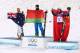 SOCHI, RUSSIA - FEBRUARY 17: (L-R) Silver medalist David Morris of Australia, gold medalist Anton Kushnir of Belarus and bronze medalist Jia Zongyang of China celebrate on the podium during the flower ceremony for the Freestyle Skiing Men's Aerials Final