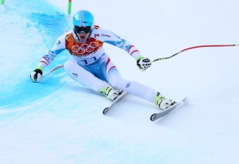 SOCHI, RUSSIA - FEBRUARY 09: (FRANCE OUT) Matthias Mayer of Austria takes the gold medal during the Alpine Skiing Men's Downhill at the Sochi 2014 Winter Olympic Games at Rosa Khutor Alpine Centre on February 09, 2014 in Sochi, Russia. (Photo by Alexis Bo