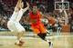 AUSTIN, TX - FEBRUARY 11: Markel Brown #22 of the Oklahoma State Cowboys drives to the basket against Javan Felix #3 of the Texas Longhorns on February 11, 2014 at the Frank Erwin Center in Austin, Texas. (Photo by Cooper Neill/Getty Images)