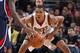 MILWAUKEE, WI - January 25: Giannis Antetokounmpo #34 of the Milwaukee Bucks defends against the Atlanta Hawks on January 25, 2014 at the BMO Harris Bradley Center in Milwaukee, Wisconsin. NOTE TO USER: User expressly acknowledges and agrees that, by dow