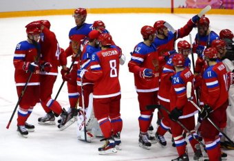 SOCHI, RUSSIA - FEBRUARY 18: Team Russia celebrate after defeating Norway 4 to 0 in the Men's Ice Hockey Qualification Playoff game on day eleven of the Sochi 2014 Winter Olympics at Bolshoy Ice Dome on February 18, 2014 in Sochi, Russia. (Photo by Stre