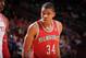 HOUSTON, TX - JANUARY 18: Giannis Antetokounmpo #34 of the Milwaukee Bucks reacts to a play against the Houston Rockets on January 18, 2014 at the Toyota Center in Houston, Texas. NOTE TO USER: User expressly acknowledges and agrees that, by downloading