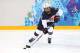 SOCHI, RUSSIA - FEBRUARY 12: Brianna Decker #14 of the United States handles the puck against Canada during the Women's Ice Hockey Preliminary Round Group A game on day five of the Sochi 2014 Winter Olympics at Shayba Arena on February 12, 2014 in Sochi,
