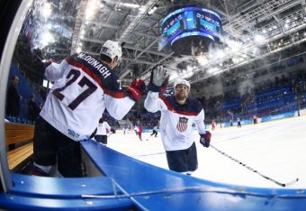 SOCHI, RUSSIA - FEBRUARY 19: Phil Kessel #81 of the United States celebrates with teammate Ryan McDonagh #27 of the United States after scoring his team's fifth goal against the Czech Republic 53 in the third period during the Men's Ice Hockey Quarterfin