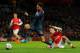 LONDON, ENGLAND - FEBRUARY 19: Laurent Koscielny of Arsenal tackles Claudio Pizarro of Bayern Muenchen during the UEFA Champions League Round of 16 first leg match between Arsenal and FC Bayern Muenchen at Emirates Stadium on February 19, 2014 in London,