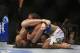 Rousey (left) has taken out many opponents with her vaunted armbar.