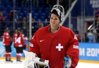 SOCHI, RUSSIA - FEBRUARY 17:  Florence Schelling #41 of Switzerland reacts after losing 3-1 against Canada during the Women's Ice Hockey Playoffs Semifinal game on day ten of the Sochi 2014 Winter Olympics at Shayba Arena on February 17, 2014 in Sochi, Ru
