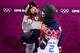 SOCHI, RUSSIA - FEBRUARY 20: Ayana Onozuka of Japan celebrates with Maddie Bowman of the United States in the Freestyle Skiing Ladies' Ski Halfpipe Finals on day thirteen of the 2014 Winter Olympics at Rosa Khutor Extreme Park on February 20, 2014 in Soc