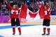 SOCHI, RUSSIA - FEBRUARY 20: Meghan Agosta-Marciano #2 and Jayna Hefford #16 of Canada celebrate after defeating the United States 3-2 in overtime during the Ice Hockey Women's Gold Medal Game on day 13 of the Sochi 2014 Winter Olympics at Bolshoy Ice Do
