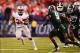 Dec 7, 2013; Indianapolis, IN, USA; Ohio State Buckeyes running back Carlos Hyde (34) runs the ball during the third quarter of the 2013 Big 10 Championship game against the Michigan State Spartans at Lucas Oil Stadium. Mandatory Credit: Andrew Weber-USA