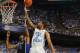 Feb 20, 2014; Chapel Hill, NC, USA; North Carolina Tar Heels guard Leslie McDonald (2) shoots as Duke Blue Devils guard Quinn Cook (2) defends. The Tar Heels defeated the Blue Devils 74-66 at Dean E. Smith Center. Mandatory Credit: Bob Donnan-USA TODAY Sp