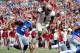 GAINESVILLE, FL - NOVEMBER 30: Kelvin Benjamin #1 of the Florida State Seminoles runs for a touchdown during the game against the Florida Gators on November 30, 2013 in Gainesville, Florida. (Photo by Sam Greenwood/Getty Images)