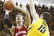 IOWA CITY, IA - FEBRUARY 22: Forward Frank Kaminsky #44 of the Wisconsin Badgers goes to the basket during the first half against forward Zach McCabe #15 of the Iowa Hawkeyes on February 22, 2014 at Carver-Hawkeye Arena, in Iowa City, Iowa. (Photo by Mat