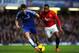 LONDON, ENGLAND - JANUARY 19: Patrice Evra of Manchester United is challenged by Oscar of Chelsea during the Barclays Premier League match between Chelsea and Manchester United at Stamford Bridge on January 19, 2014 in London, England. (Photo by Mike He