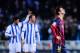 SAN SEBASTIAN, SPAIN - FEBRUARY 22: Lionel Messi of FC Barcelona reacts after Antoine Griezmann of Real Sociedad scored his team's second goal goal during the La Liga match between Real Sociedad and FC Barcelona at Estadio Anoeta on February 22, 2014 in