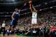 BOSTON, MA - FEBRUARY 9: Avery Bradley #0 of the Boston Celtics shoots the ball against Vince Carter #25 of the Dallas Mavericks on February 9, 2014 at the TD Garden in Boston, Massachusetts. NOTE TO USER: User expressly acknowledges and agrees that, by
