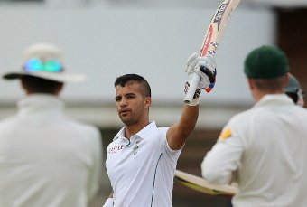 PORT ELIZABETH, SOUTH AFRICA - FEBRUARY 21: Michael Clarke and Brad Haddin of Australia looks on as JP Duminy of South Africa celebrates after scoring 100 runs during day two of the Second Test match between South Africa and Australia at AXXESS St George'
