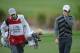 PALM BEACH GARDENS, FL - MARCH 01: World number one and defending champion, Rory McIlroy of Northern Ireland walks off the course on the 18th hole, his nineth with caddie J.P Fitzgerald during the second round of the Honda Classic on March 1, 2013 in Pal