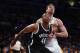 LOS ANGELES, CA - FEBRUARY 23: Jason Collins #46 of the Brooklyn Nets and Pau Gasol #16 of the Los Angeles Lakers battle for position under the net in the second half at Staples Center on February 23, 2014 in Los Angeles, California. The Nets defeated th