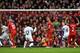 LIVERPOOL, ENGLAND - FEBRUARY 23: Simon Mignolet of Liverpool reacts after Swansea's second goal during the Barclays Premier League match between Liverpool and Swansea City at Anfield on February 23, 2014 in Liverpool, England. (Photo by Clive Brunskill