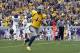 MORGANTOWN, WV - NOVEMBER 03: Tavon Austin #1 of the West Virginia Mountaineers catches a forty three yard touchdown pass against the TCU Horned Frogs during the game on November 3, 2012 at Mountaineer Field in Morgantown, West Virginia. (Photo by Justi