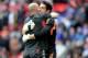 LONDON, ENGLAND - APRIL 14: Brad Jones of Liverpool (R) celebrates with fellow goalkeeper Pepe Reina after the FA Cup with Budweiser Semi Final match between Liverpool and Everton at Wembley Stadium on April 14, 2012 in London, England. (Photo by Shaun