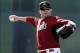 Feb 12, 2014; Scottsdale, AZ, USA; Arizona Diamondbacks outfielder mark Trumbo (15) throws in the outfield during camp at Salt River Fields. Mandatory Credit: Rick Scuteri-USA TODAY Sports