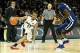 Feb 18, 2014; Providence, RI, USA; Providence Friars guard Bryce Cotton (11) dribbles the ball against Villanova Wildcats guard James Bell (32) in the first half at Dunkin Donuts Center. Mandatory Credit: David Butler II-USA TODAY Sports