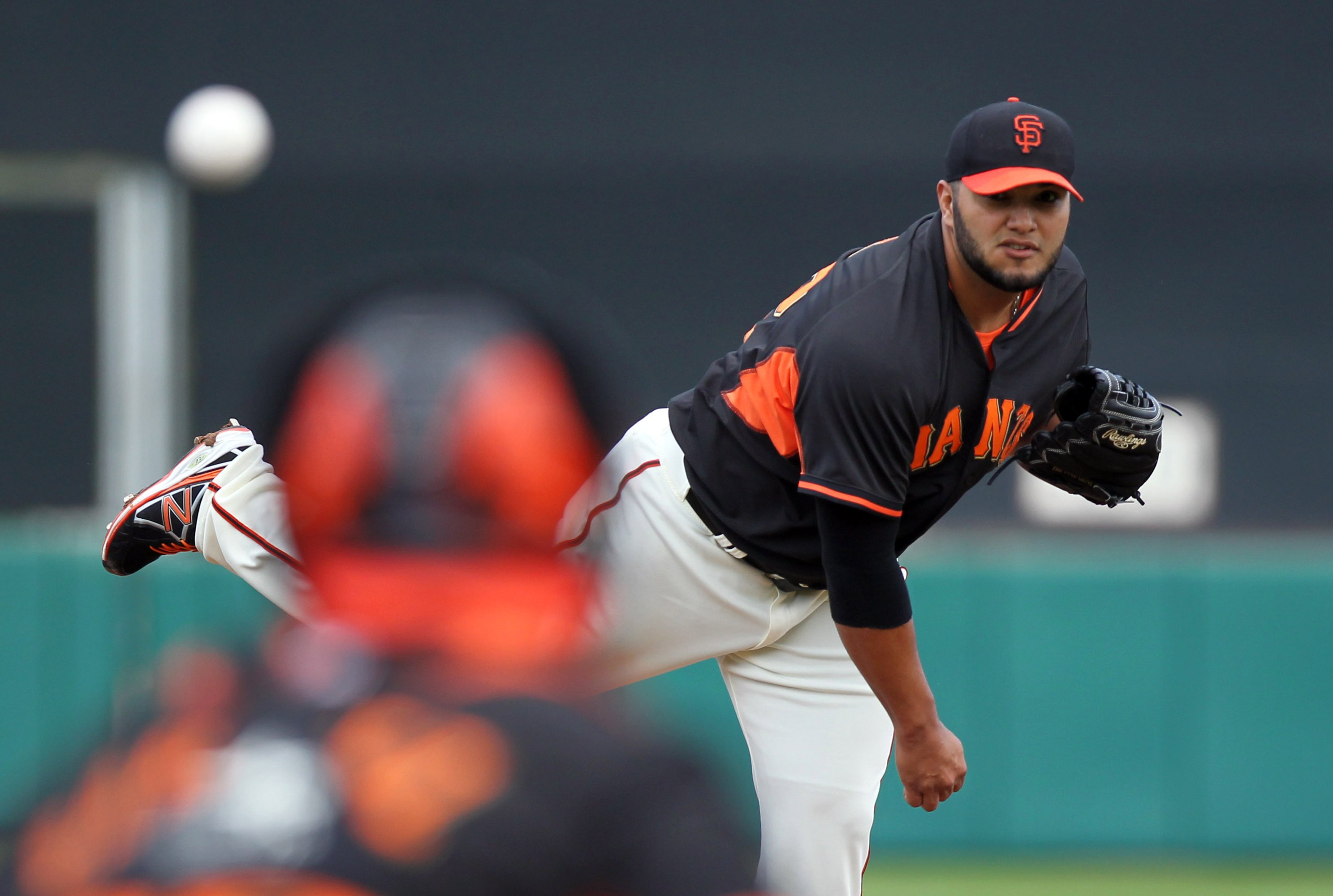 Sandoval pitches the ninth and Law scores a run in Giants blowout