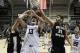 Dec 7, 2013; Evanston, IL, USA; Northwestern Wildcats forward Kale Abrahamson (13) Western Michigan Broncos forward Connar Tava (2) and forward Mario Matasovic (31) go for a rebound during the first half at Welsh-Ryan Arena. Mandatory Credit: David Banks-