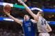 Mar 22, 2013; Philadelphia, PA, USA; Florida Gulf Coast Eagles guard Brett Comer (0) shoots a layup during the second half against the Georgetown Hoyas during the second round of the 2013 NCAA tournament at the Wells Fargo Center. Florida Gulf Coast defea