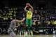 Feb 23, 2014; Eugene, OR, USA; Oregon Ducks guard Joseph Young (3) shoots a three point basket in the second half against the Washington State Cougars at Matthew Knight Arena. Mandatory Credit: Scott Olmos-USA TODAY Sports
