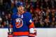 UNIONDALE, NY - JANUARY 06: Andrew MacDonald #47 of the New York Islanders skates against the Dallas Stars at Nassau Veterans Memorial Coliseum on January 6, 2014 in Uniondale, New York. Islanders defeated the Stars 7-3. (Photo by Mike Stobe/NHLI via Ge