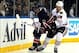Feb 27, 2014; New York, NY, USA; New York Rangers defenseman Marc Staal (18) and Chicago Blackhawks left wing Bryan Bickell (29) battle for the puck during the first period at Madison Square Garden. Mandatory Credit: Adam Hunger-USA TODAY Sports