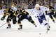 BOSTON, MA - NOVEMBER 11: Steven Stamkos #91 of the Tampa Bay Lightning skates with the puck against Jarome Iginla #12 and Matt Bartkowski #43 of the Boston Bruins at the TD Garden on November 11, 2013 in Boston, Massachusetts. (Photo by Brian Babineau/