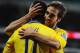 CARDIFF, WALES - NOVEMBER 30: Mathieu Flamini of Arsenal (R) celebrates with Mesut Oezil as he scores their second goal during the Barclays Premier League match between Cardiff City and Arsenal at Cardiff City Stadium on November 30, 2013 in Cardiff, Wal