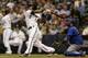 MILWAUKEE, WI - SEPTEMBER 18: Khris Davis #18 of the Milwaukee Brewers hits a solo home run in the bottom of the fourth inning against the Chicago Cubs at Miller Park on September 18, 2013 in Milwaukee, Wisconsin. (Photo by Mike McGinnis/Getty Images)