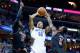 MEMPHIS, TN - MARCH 01: Geron Johnson #55 of the Memphis Tigers shoots the ball against the Louisville Cardinals during the game at FedExForum on March 1, 2014 in Memphis, Tennessee. (Photo by Andy Lyons/Getty Images)